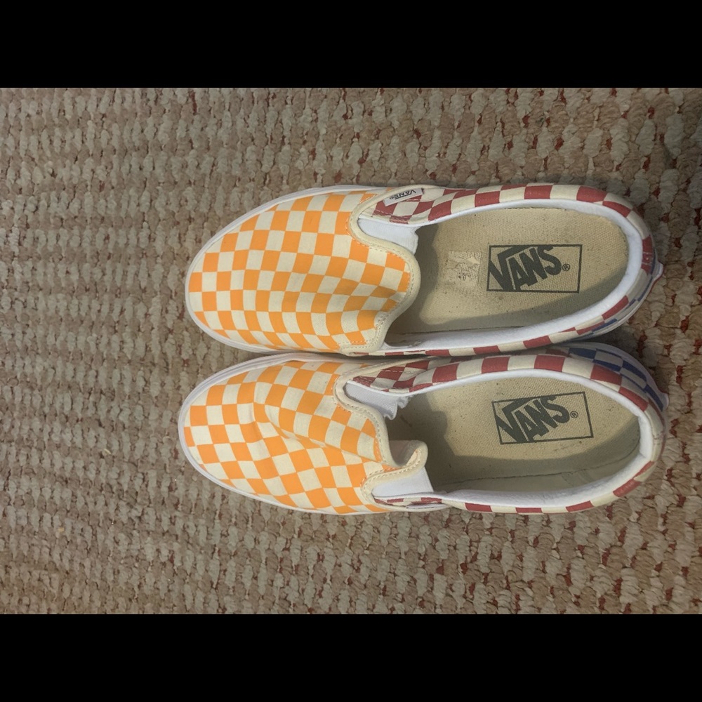 Red and yellow and blue slip on vans